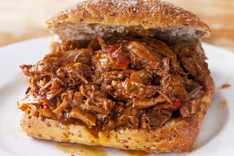 BBQ pulled pork sandwich on whole grain bun