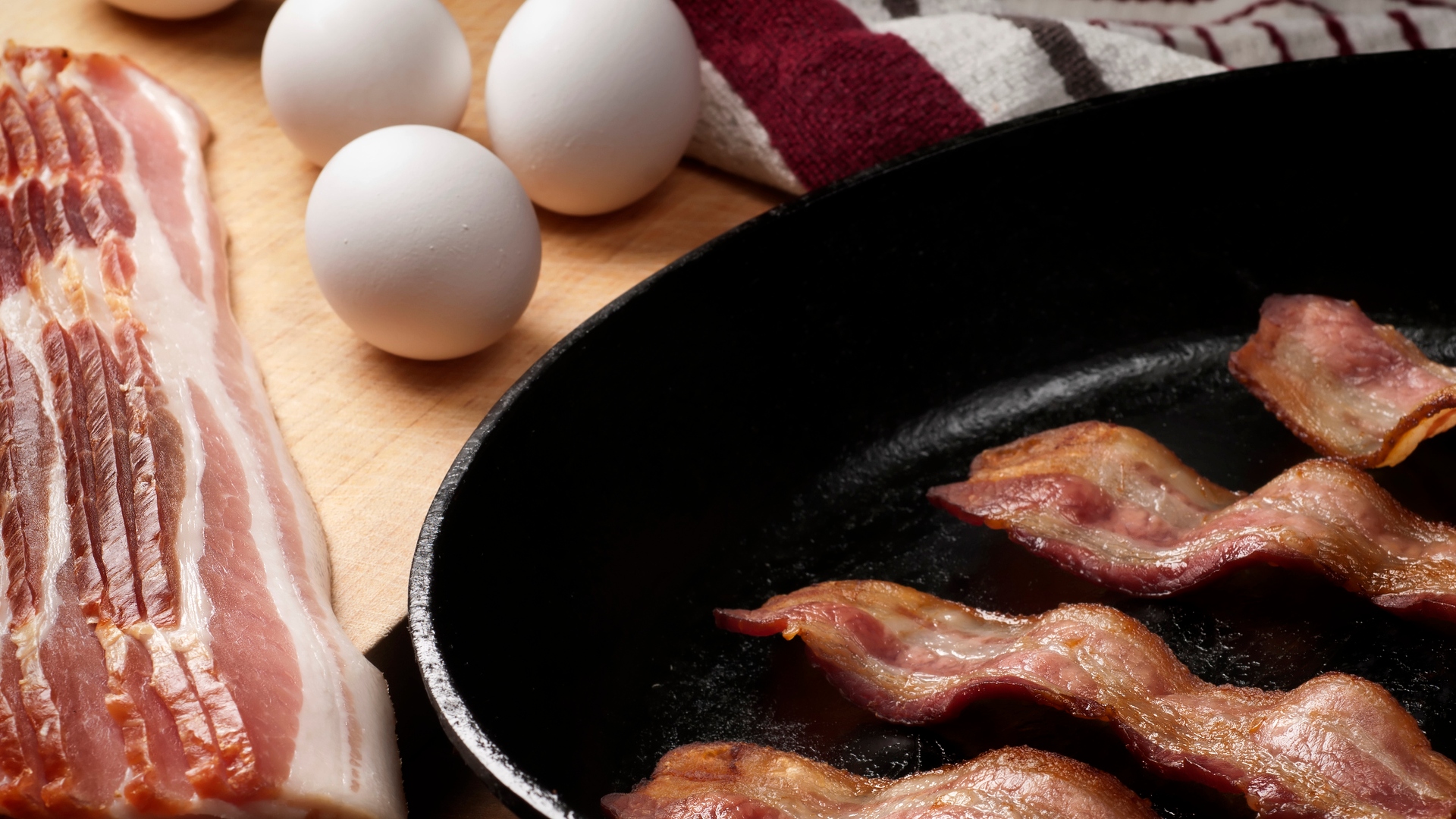 eggs and bacon in a skillet