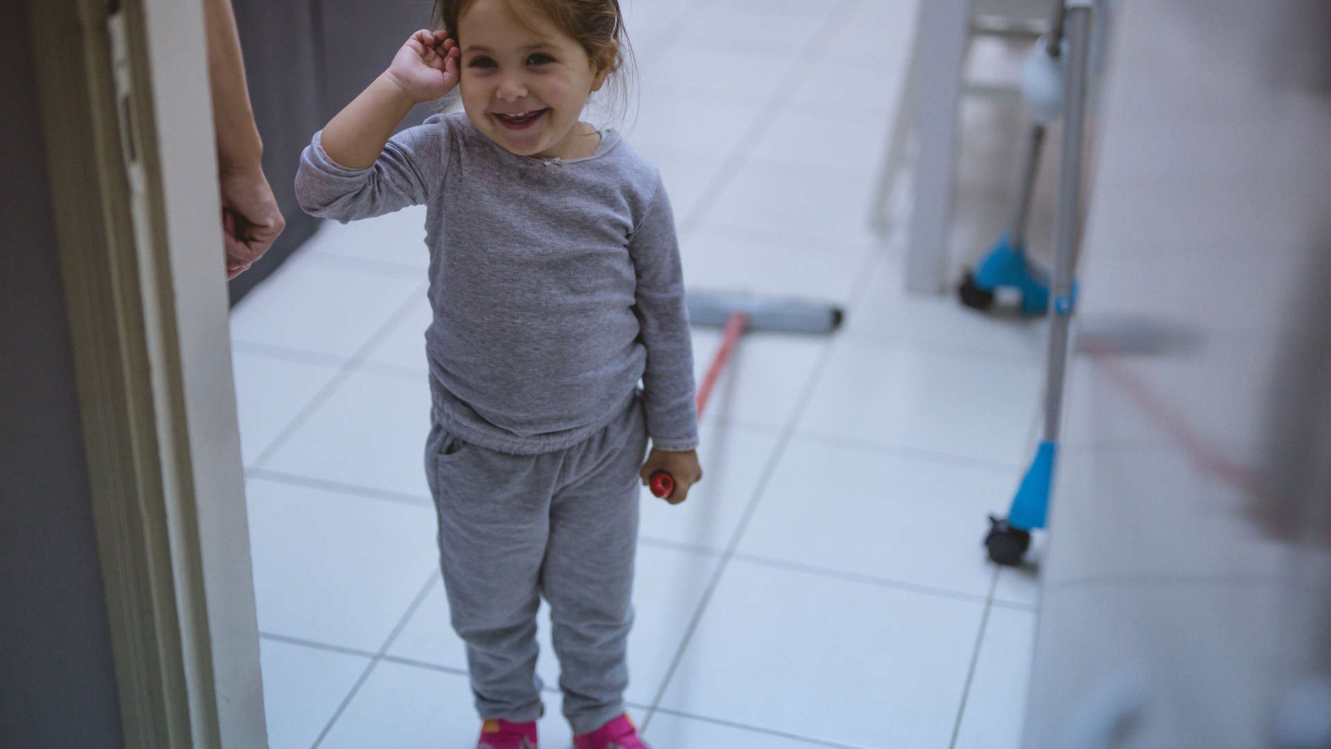 child cleaning the floor