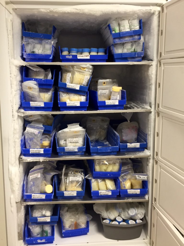 A freezer of labeled breast milk at the INTEGRIS NICU