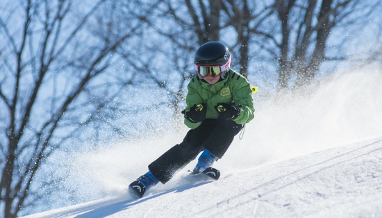 child skiing